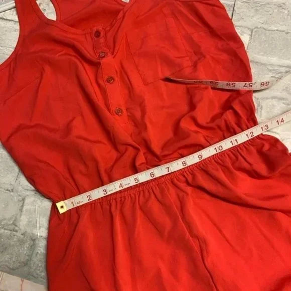 NWT Forever 21 Coral Red Sleeveless Button Front Romper. Size Medium.