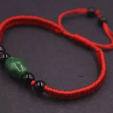 NWT Lucky Red String Thread Braided Knitted Jade Green Oval Bead Small Bracelet